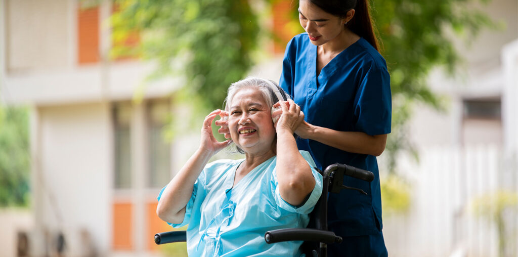 carer providing dementia support at home